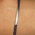 f) Tube et lien tressé