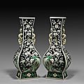 Famille noire enameled, kangxi-style porcelain vases, 19th century or earlier