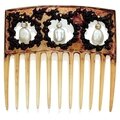 An art nouveau horn, natural pearl and diamond hair comb, by lalique