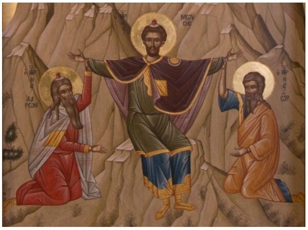 Moïse les bras en croix soutenu par Aaron