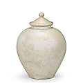 A cream-glazed jar and cover, tang dynasty (618-907)