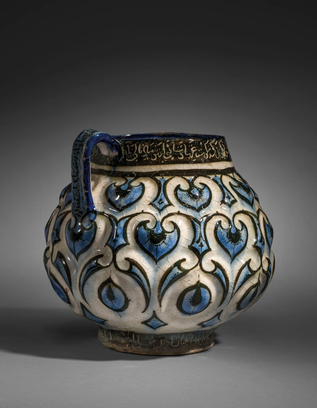 2020_CKS_18371_0004_007(a_kashan_moulded_cobalt-blue_black_and_white_jug_central_iran_early_13_d6255679)