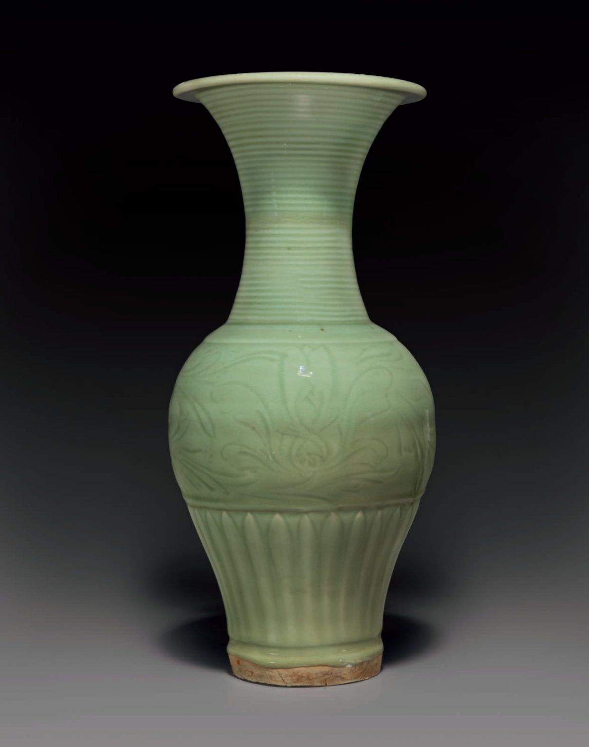 A carved Longquan celadon 'phoenix-tail' vase, Late Yuan-early Ming dynasty, 14th century