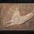 A rare large pottery tile of a tiger, han dynasty (220 bc-ad 220)