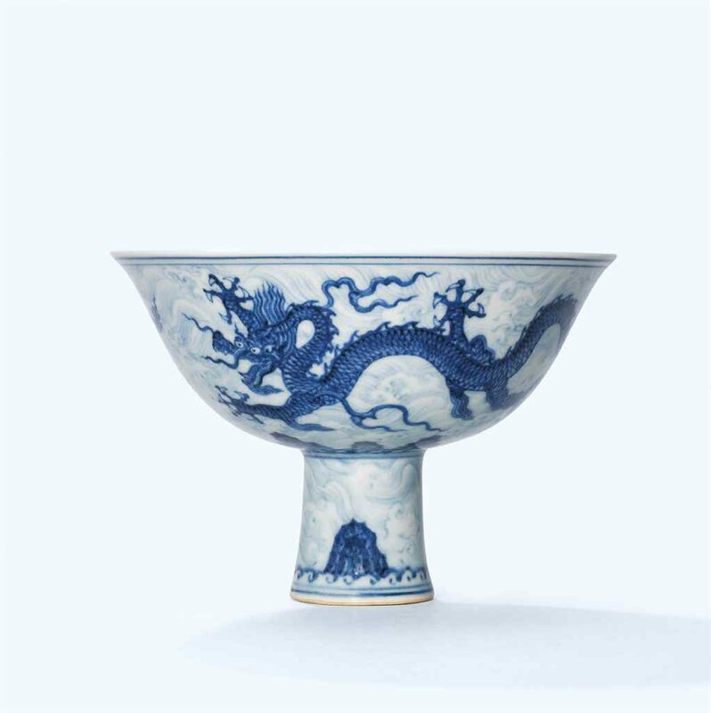 An extremely rare and superbly painted anhua-decorated blue and white ‘dragon’ stem bowl, Xuande six-character mark in underglaze blue within a double circle and of the period (1426-1435)