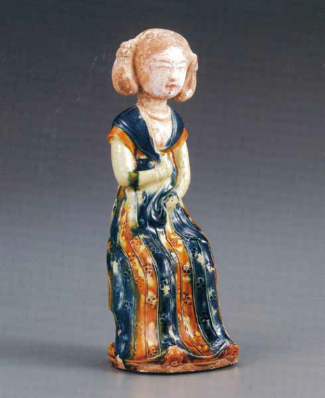 A blue and amber-glazed pottery figure of a seated lady, Tang dynasty (618-907), Collection of the Nezu Museum
