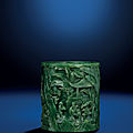 A small finely carved spinach jade cylindrical brush pot, bitong, qing dynasty, 18th century