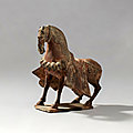 A painted pottery figure of a caparisoned horse, northern wei dynasty (386-534)