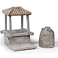 A grey pottery model of a roofed wellhead and a grey pottery bear-shaped lamp base, han dynasty