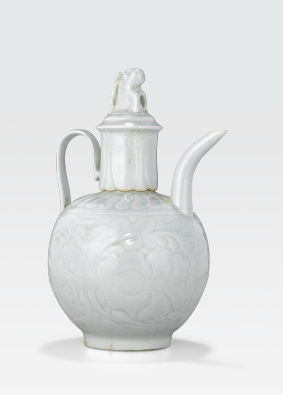 A qingbai glazed porcelain ewer with cover