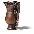 An archaistic rhinoceros horn rhyton cup, 17th-18th century