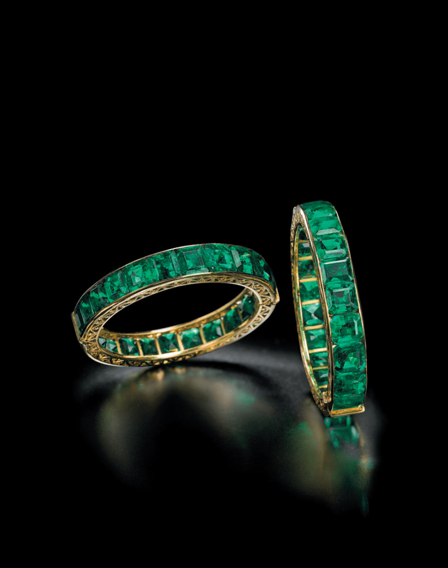 A superb pair of antique emerald bangles
