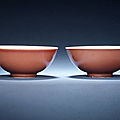 A fine pair of red-glazed bowls. yongzheng six-character marks and of the period