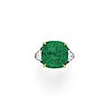 A cushion-cut emerald and diamond ring