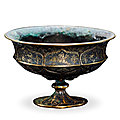 A gilt-silver 'hunting scene' stem cup, tang dynasty (618-907)