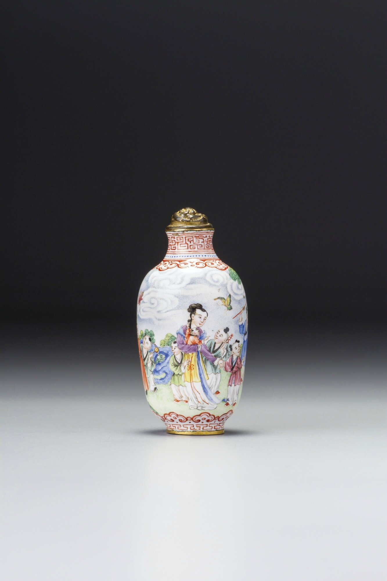 An Imperial Canton enamel 'Lady and children' snuff bottle