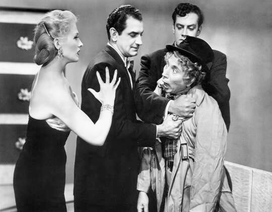 1949-Love_Happy-film-scene-ilona_massey-02-1-with_Bruce_Gordon__Raymond_Burr_Harpo-1