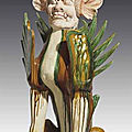 A large sancai-glazed pottery figure of an earth spirit, zhenmushou, Tang dynasty (618-907) 
