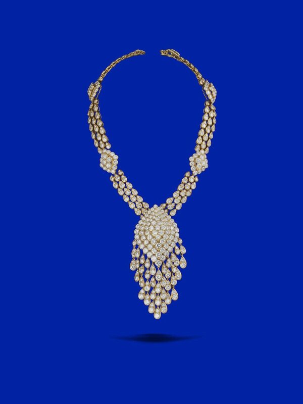 A DIAMOND AND GOLD 'HELENE' NECKLACE BY VAN CLEEF & ARPELS