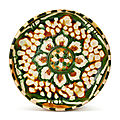 An impressive sancai 'lotus' dish, Tang dynasty (618-907)