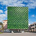 Machado silvetti wraps the facade of asian art building in jade