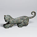 A bronze tiger-form finial, warring states period (475–221 b.c.)