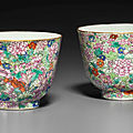 A rare pair of famille rose mille fleurs cups, jiaqing six-character seal marks in iron red and of the period (1796-1820)