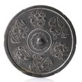 A bronze mirror decorated with blossoms, korea, koryo period