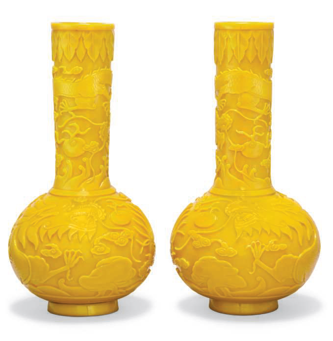 A pair of yellow glass 'Dragon' bottle vases, 19th-20th century
