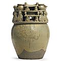 A 'yue' celadon-glazed funerary jar with buddhist figures, western jin dynasty