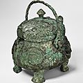 A rare bronze double-owl-form ritual vessel (you), Shang Dynasty