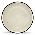 A small molded Ding dish, Jin dynasty (1115-1234)
