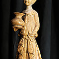A straw-glazed pottery figure of a court lady, Sui Dynasty (589-618 AD)