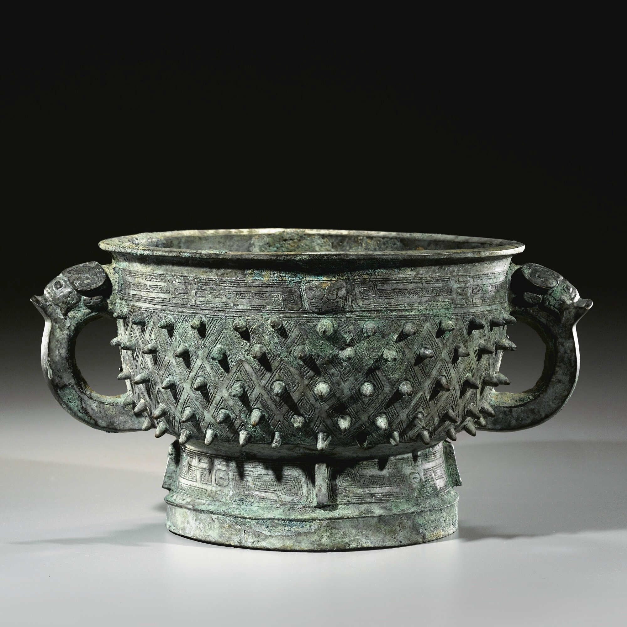 A fine archaic bronze ritual food vessel, gui, Late Shang dynasty (c
