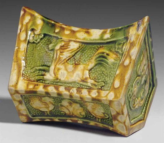 A rare small sancai-glazed pottery pillow, Tang dynasty (618-907)