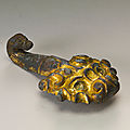 A gilt-bronze belt hook, han dynasty (206 bc-220 ad)