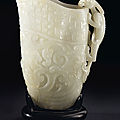 A finely carved white jade archaistic rhyton, china, qing dynasty, 17th-18th century
