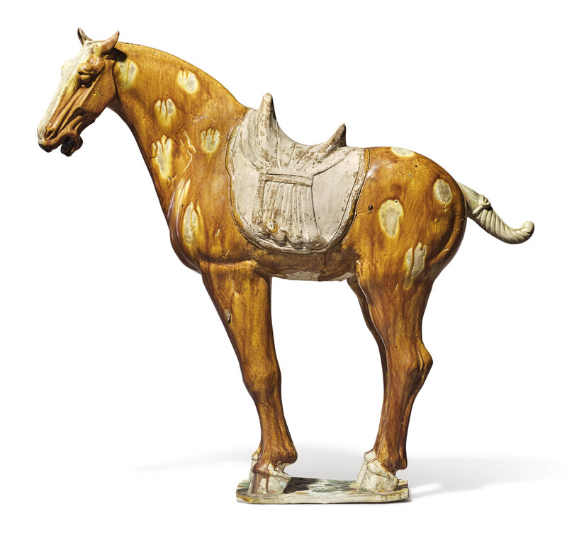 An amber-glazed pottery figure of a horse, Tang dynasty (618-907)