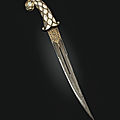 A serpentine and rock-crystal hilted dagger north india, probably helps 19th century; blade india or iran, dated ah 1198 / 1783