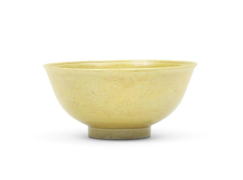 A yellow-glazed 'dragon' bowl, Kangxi six-character mark and of the ...