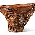 A finely carved rhinoceros horn 'Landscape' libation cup, 17th century