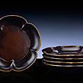 A rare set of five brown lacquer prunus-shaped dishes, song dynasty (960-1279)
