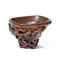 A very rare rhinoceros horn 'nine-chilong' libation cup, 17th-18th century