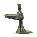 A rare bronze 'kneeling lady' oil lamp, qin - han dynasty