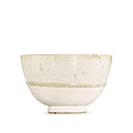 A transparent-glazed whiteware deep bowl, Sui - early Tang dynasty