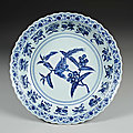 Dish, blue-and-white with design of a bird eating a loquat, ming dynasty, yongle period (1403-1424)