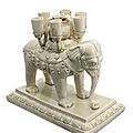 An important and very rare white-glazed ‘elephant’ candle stand, sui-early tang dynasty, 6th-7th century