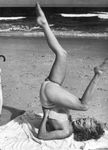 1949_tobey_beach_by_dedienes_umbrella_red_075_1