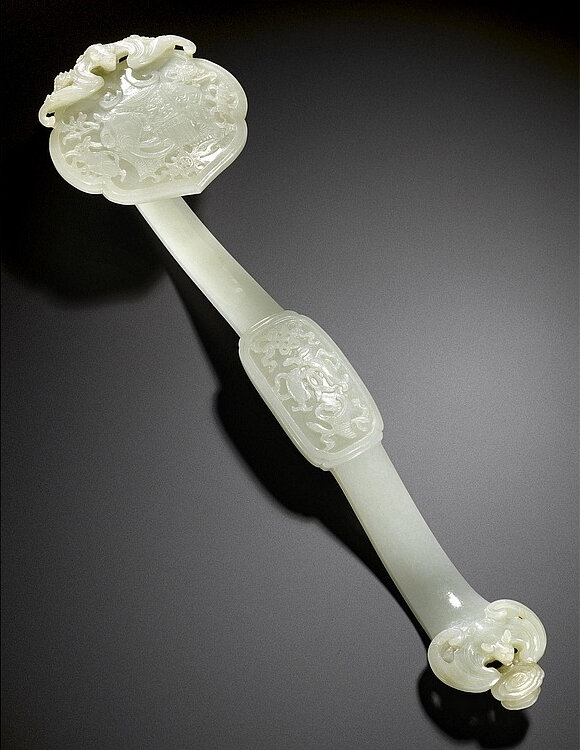 A celadon white jade 'bajixiang' ruyi sceptre, Qing dynasty, Qianlong period (1736-1795)