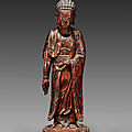 Red and gold lacquered wood figure of buddha, vietnam, 18th century
